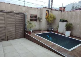 Foto 1 de Casa com 4 Quartos à venda, 170m² em Jardim Três Marias, Guarujá