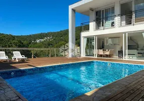 Foto 1 de Casa de Condomínio com 4 Quartos à venda, 344m² em Itacorubi, Florianópolis