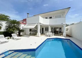 Foto 1 de Sobrado com 4 Quartos à venda, 300m² em Balneário Praia do Pernambuco, Guarujá