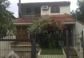 Foto 1 de Casa com 3 Quartos à venda, 184m² em Santo Antônio, Porto Alegre