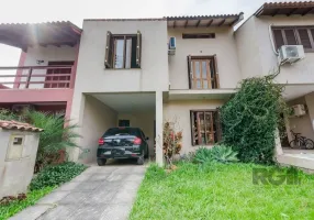 Foto 1 de Casa de Condomínio com 3 Quartos à venda, 166m² em Guarujá, Porto Alegre