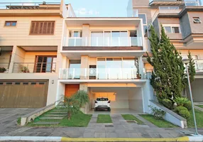 Foto 1 de Casa de Condomínio com 3 Quartos à venda, 357m² em Vila Nova, Porto Alegre