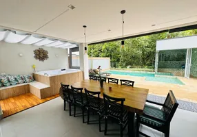 Foto 1 de Casa com 5 Quartos para alugar, 400m² em Riviera de São Lourenço, Bertioga