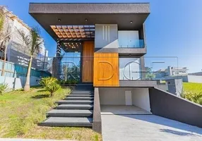 Foto 1 de Casa de Condomínio com 4 Quartos à venda, 286m² em Vila Nova, Porto Alegre