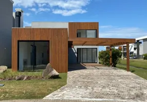 Foto 1 de Casa de Condomínio com 4 Quartos à venda, 150m² em Xangri la, Xangri-lá