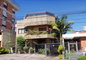 Foto 1 de Casa com 3 Quartos para alugar, 416m² em Auxiliadora, Porto Alegre
