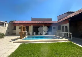 Foto 1 de Casa de Condomínio com 7 Quartos à venda, 459m² em Barra da Tijuca, Rio de Janeiro