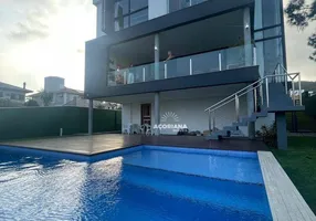 Foto 1 de Casa com 3 Quartos para alugar, 408m² em Lagoa da Conceição, Florianópolis