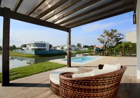 Foto 1 de Casa de Condomínio com 5 Quartos à venda, 380m² em Sans Souci, Eldorado do Sul