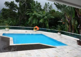 Foto 1 de Casa com 6 Quartos à venda, 480m² em Balneário Praia do Perequê , Guarujá