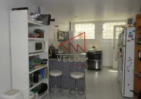 Foto 1 de Casa com 3 Quartos à venda, 320m² em Laranjeiras, Rio de Janeiro