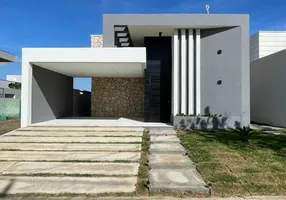 Foto 1 de Casa de Condomínio com 4 Quartos à venda, 187m² em Cidade Alpha, Eusébio