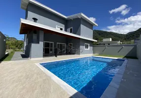 Foto 1 de Casa de Condomínio com 5 Quartos à venda, 375m² em Lagoinha, Ubatuba