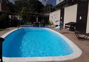 Foto 1 de Casa de Condomínio com 3 Quartos para alugar, 100m² em Parque Real Serra Verde, Camaçari