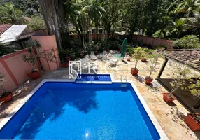 Foto 1 de Sobrado com 4 Quartos à venda, 600m² em Balneário Praia do Perequê , Guarujá