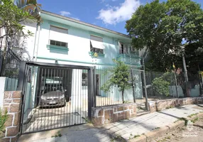 Foto 1 de Casa com 4 Quartos para venda ou aluguel, 350m² em Auxiliadora, Porto Alegre