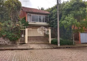 Foto 1 de Casa com 4 Quartos à venda, 231m² em Santo Antônio, Porto Alegre