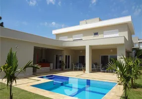 Foto 1 de Casa com 4 Quartos à venda, 322m² em Alphaville Dom Pedro, Campinas