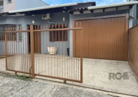 Foto 1 de Casa com 2 Quartos à venda, 104m² em Vila Nova, Porto Alegre