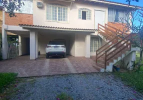 Foto 1 de Casa com 5 Quartos à venda, 155m² em Ibiraquera, Imbituba