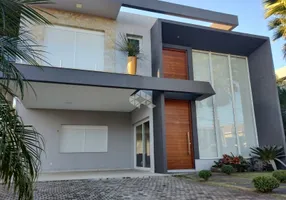 Foto 1 de Casa de Condomínio com 4 Quartos à venda, 380m² em Atlantida, Xangri-lá