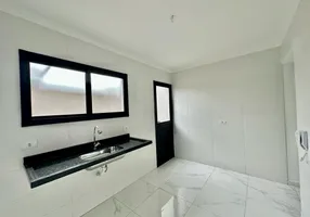 Foto 1 de Casa de Condomínio com 2 Quartos à venda, 56m² em Tude Bastos, Praia Grande