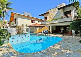 Foto 1 de Casa de Condomínio com 6 Quartos à venda, 297m² em Riviera de São Lourenço, Bertioga