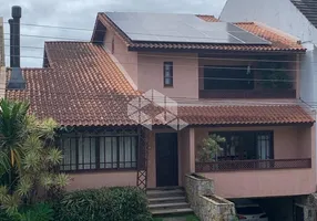 Foto 1 de Casa de Condomínio com 3 Quartos à venda, 284m² em Agronomia, Porto Alegre