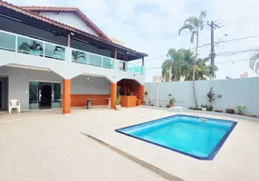 Foto 1 de Sobrado com 4 Quartos à venda, 245m² em Vila Tupi, Praia Grande