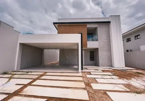 Foto 1 de Casa de Condomínio com 4 Quartos à venda, 180m² em Centro, Eusébio