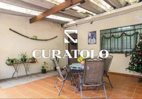 Foto 1 de Sobrado com 2 Quartos à venda, 107m² em Vila Lutecia, Santo André