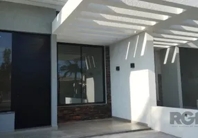 Foto 1 de Casa com 3 Quartos à venda, 96m² em Capao da Canoa, Capão da Canoa