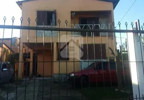 Foto 1 de Casa com 3 Quartos à venda, 90m² em Tarumã, Viamão