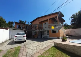 Foto 1 de Casa com 3 Quartos à venda, 274m² em Vila Nova, Porto Alegre