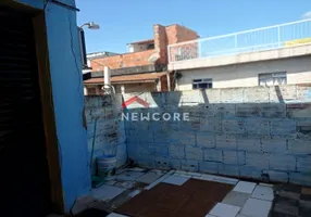 Foto 1 de Casa com 2 Quartos à venda, 60m² em Macuco, Santos