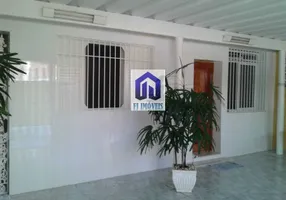 Foto 1 de Casa com 2 Quartos à venda, 91m² em Vila Voturua, São Vicente