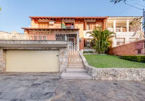 Foto 1 de Casa com 3 Quartos à venda, 408m² em Partenon, Porto Alegre