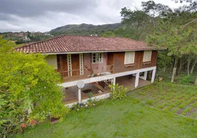 Foto 1 de Casa de Condomínio com 5 Quartos à venda, 400m² em Aconchego Da Serra, Itabirito