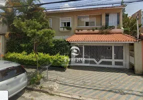 Foto 1 de Sobrado com 4 Quartos à venda, 259m² em Vila Pires, Santo André