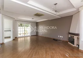 Foto 1 de Casa de Condomínio com 4 Quartos à venda, 272m² em Chácara das Pedras, Porto Alegre