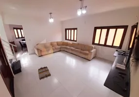 Foto 1 de Sobrado com 3 Quartos à venda, 105m² em Martim de Sa, Caraguatatuba