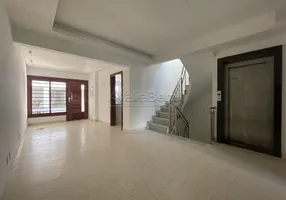 Foto 1 de Casa de Condomínio com 3 Quartos para alugar, 273m² em Praia de Belas, Porto Alegre