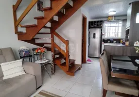 Foto 1 de Casa de Condomínio com 2 Quartos à venda, 68m² em Restinga, Porto Alegre