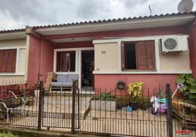 Foto 1 de Casa de Condomínio com 2 Quartos à venda, 68m² em São Tomé, Viamão