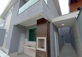 Foto 1 de Sobrado com 3 Quartos à venda, 135m² em Vila Tupi, Praia Grande