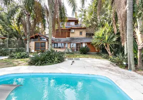 Foto 1 de Casa com 4 Quartos para alugar, 394m² em Pedra Redonda, Porto Alegre