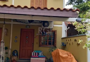 Foto 1 de Casa de Condomínio com 3 Quartos à venda, 119m² em Camaquã, Porto Alegre