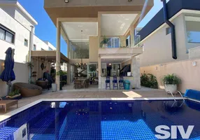 Foto 1 de Casa com 5 Quartos à venda, 296m² em Riviera de São Lourenço, Bertioga