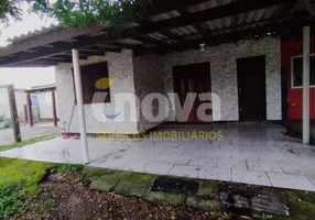 Foto 1 de Casa com 3 Quartos à venda, 110m² em Praia de Mariluz, Imbé