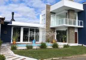 Foto 1 de Casa de Condomínio com 3 Quartos à venda, 263m² em Cruzeiro do Sul II, Tramandaí